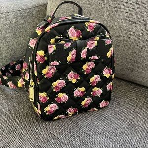 Betsey Johnson Black Rose Floral Leather Backpack, no tag, but never been used.
